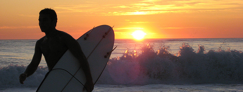 Surfer Surfer at sunset